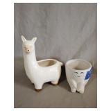 2- Planters, llama 5'x8', figure 4'x4'