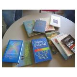 Christian-Themed Books in a Green Plastic Bin