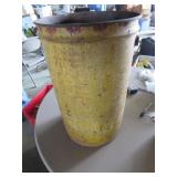 Yellow Metal Drum with Rusted Exterior