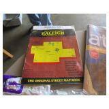 Lot With Maps, Books, Figurines, Yarn, and Decor I