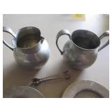 Pewter Creamers, Plates, and Tongs