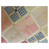 Handmade Quilt with Geometric Patterns and Gingham