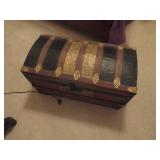 Wooden Trunk with Black and Brass Accents and Stri