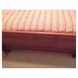 Wooden Bed Frame with Turned Posts and Paneled Hea