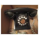 Two Telephones: Rotary Dial and GE Cordless Model