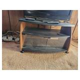 Small Glass & Wood Tv Stand. Items on top not incl