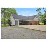 Covered Carport with Convenient Parking and Easy Access to the Home