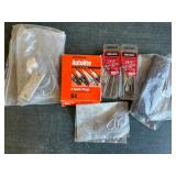 Lot of spark plug and bolts