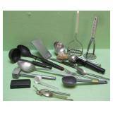 Assorted Kitchen Drawer Items With Mashers