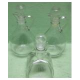 Three Glass Bottle Decanters With Stoppers