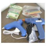 Two Working Glue Guns With Some Glue Sticks