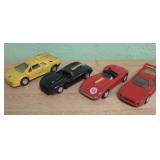 Four Assorted Toy Cars