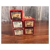 Stack of Lee Bullet Molds in Boxes