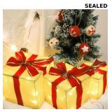 Set of 3 lighted gift boxes with red bows