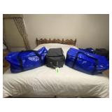 3- ZIPPERED BAGS OF CLOTHING
