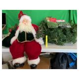 LARGE SEATED SANTA & PRE LIT GARLAND