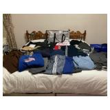 2 ZIPPERED BAGS OF CLOTHING