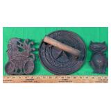 CAST IRON TRIVETS/SP0ON REST /ONE W/ WOODEN HANDLE