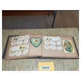 ANTIQUE SCRAP BOOK WITH TRADE CARDS TO INCLUDE 1889 CALENDARS, CHILDREN'S BOOKS AND MORE