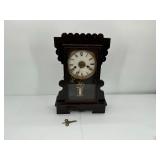 ANTIQUE OAK NEW HAVEN MANTEL CLOCK WITH FANCY PENDULUM
