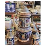 German Stein Pitcher With Individual Steins