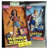 2 Barbie Dolls. Wonder Woman, Supergirl