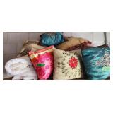Decorative Accent Pillows On Top Of Shelf. In