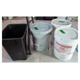 5 Gallon Buckets Partially Filled With Smoking