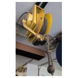 Hanging Power Cord Reel. Mounted To Ceiling.