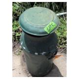 Green Painted Milk Can. Outside Backyard