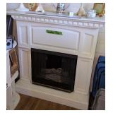 Electric Fireplace 42x13x42'. Items On Top Not