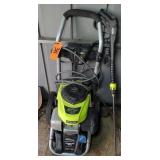 Ryobi Powered By Honda Pressure Washer. Outside