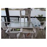 Glass Top Patio Table, Vinyl Stacking Chairs,