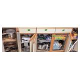 Kitchen Wares In Lower Cabinets. Food Items,