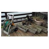 Driftwood, Hose Reel, Planters. Outside On Porch
