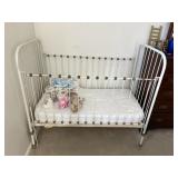 large metal display bed with drop sides