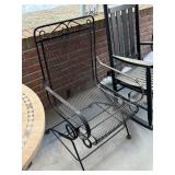 4 matching wrought iron bouncy chairs back porch