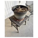 wood table with metal legs,& planter front porch
