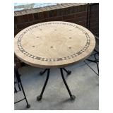 metal table 30' round x 28.75' tall back porch