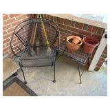wrought iron chair and table , flower pots