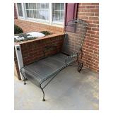 wrought iron lounge chair  back porch