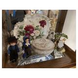 second shelf of curio cabinet