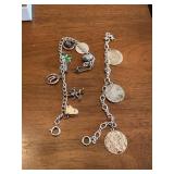 2 sterling silver charm bracelets  dining room