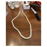 small string of pearls 16' very pretty and heavy,