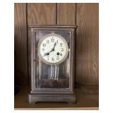 very heavy mantle clock in glass case,with key