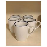 6  white ceramic mugs with blue rims,