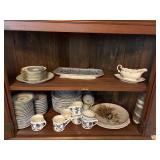 contents bottom of corner hutch china, dishes, etc