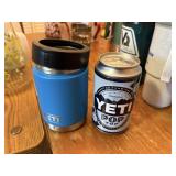 blue YETI can holder with YETI pop top