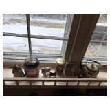 everything on shelf above sink, teapot, nest/ eggs