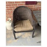 3 padded seat brown wicker arm chairs back porch